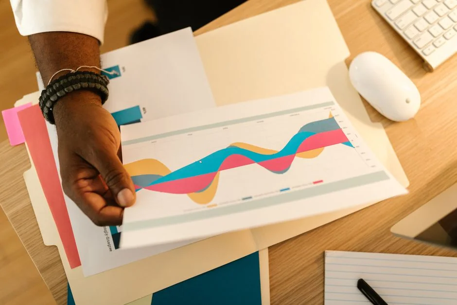 Flat lay of employer branding materials arranged on an office table, highlighting marketing and design.